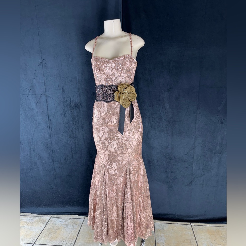Elegant Lace Evening Gown with Floral Accent by Mandalay